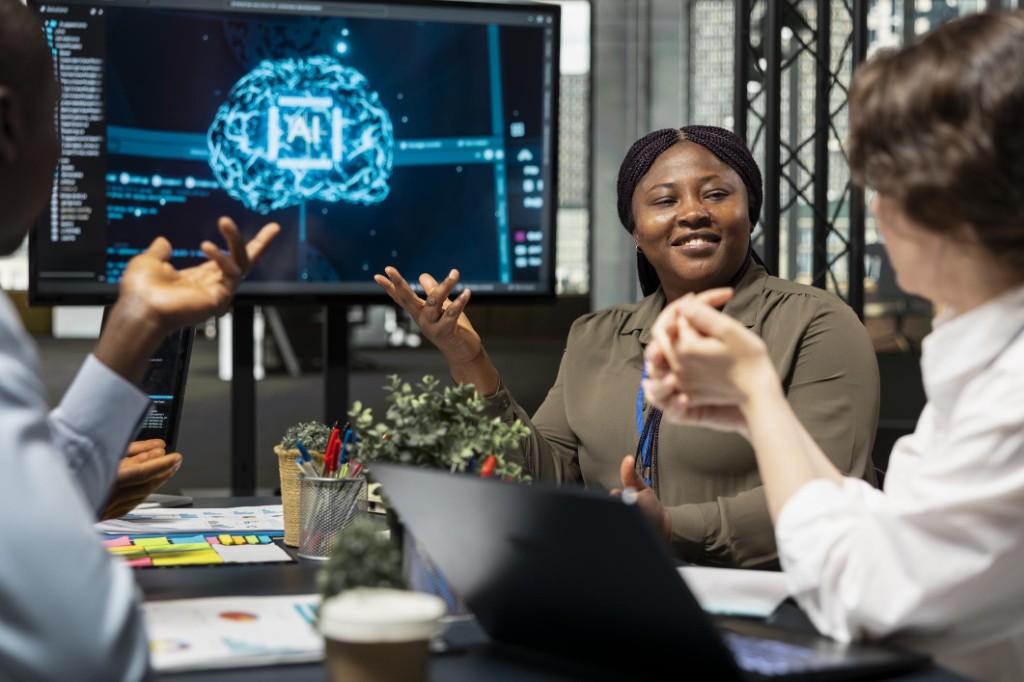 Procurement team collaborating with AI-assisted analysis on a large display